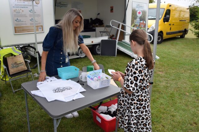 Homes in Sedgemoor colleague with someone at a fun day