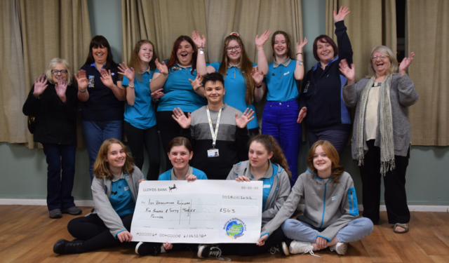 Group holding a Making a Difference cheque.